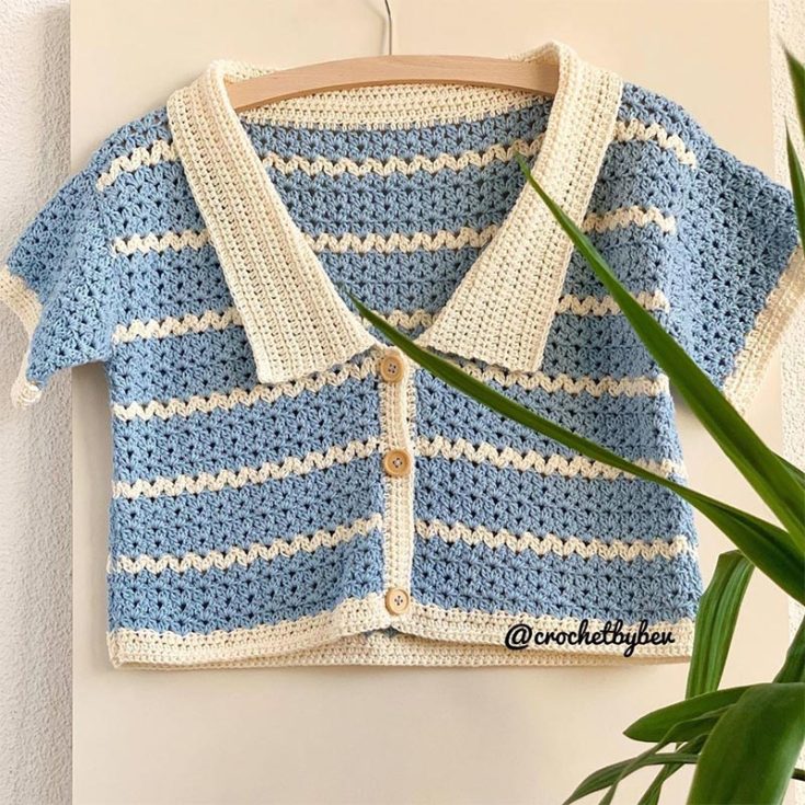 This is a charming vintage crochet top with lovely lapels, dainty stripes, and a button-up&nbsp;front.