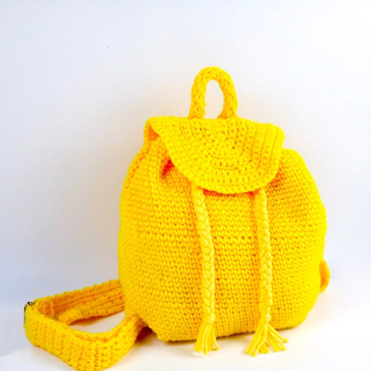 This is a great tutorial on how to crochet a mini backpack. Its not miniature mini so you can still carry some stuff in it, but it's small enough to a cute accessory for summer. This is an intermediate-level backpack pattern.