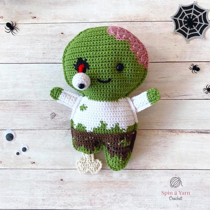 I absolutely love the unique 2D effect this zombie crochet pattern has. This undead friend is made in 9 separate pieces and it requires tapestry (or intarsia) crochet technique to work on the colors. Fear not for this tutorial has you thoroughly covered with its detailed instructions for your amigurumi crochet patterns.