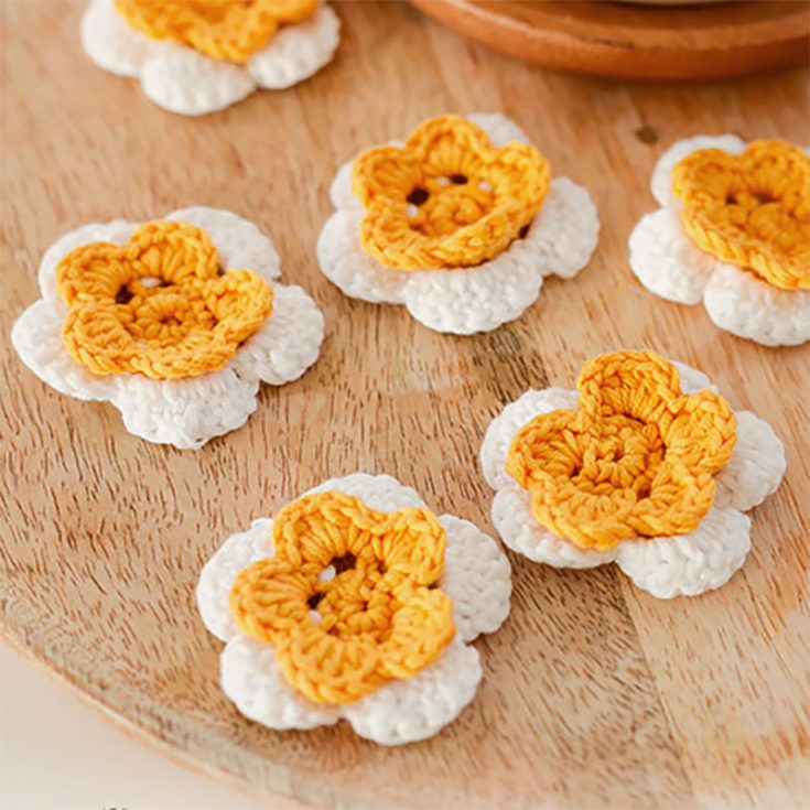 This is one of those simple flower crochet patterns that you can work up within a few minutes. Easily make them in bulk as flowers for a flower girl to throw down the aisle or just decorate them around your house.