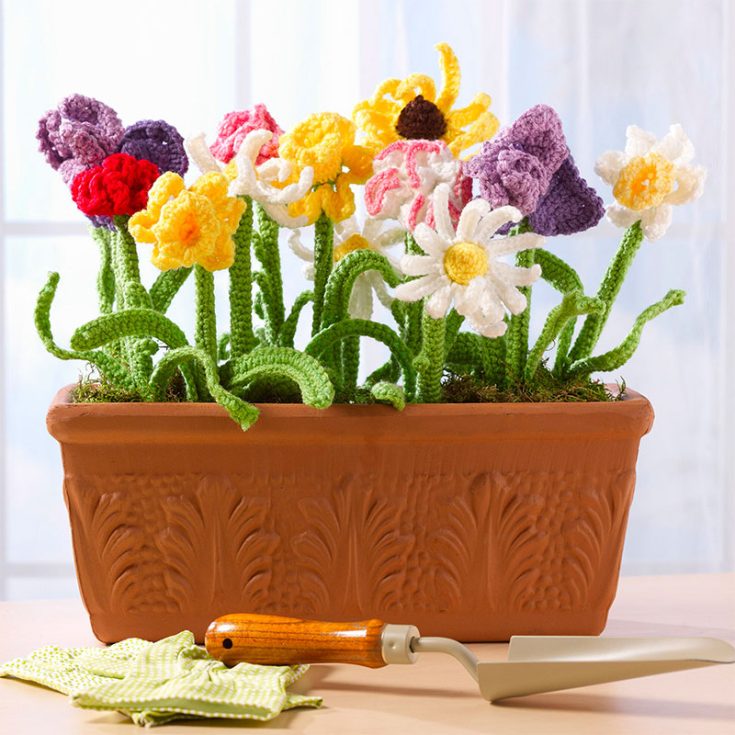 This beautiful assortment of flowers makes this bouquet much more interesting and colorful than the others that we've shared on this list. It is available for free download on Yarnspiration.