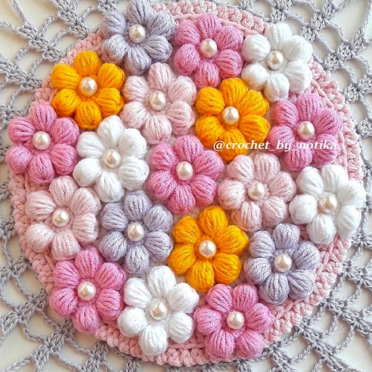 This puff stitch flower tutorial is ideal for a simpler crochet pattern. It still has that distinct 3D effect that makes it stand out.