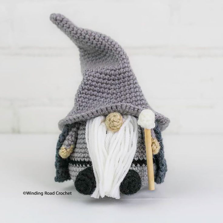If you're a Harry Potter fan, then undoubtedly, this gnome pattern will scream Dumbledore vibes to you. With a wide-brimmed hat to keep the sun out of his eyes, a long cape to keep him warm, and his magical stick, this wizard gnome is ready to go on an epic journey to slay the bad guys and bring harmony to whatever fantasy land you want him to go to. So, are you ready for the epic journey of creating this gnome?