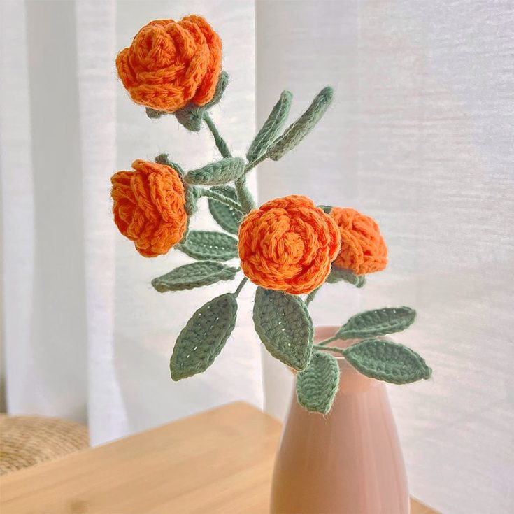 A bunch of crochet roses can be used for so many things! Gifts for special occasions, home decorations, and embellishments. Learn how to make one today with this beginner-friendly crochet rose that is put together by rolling up a crocheted strip.
