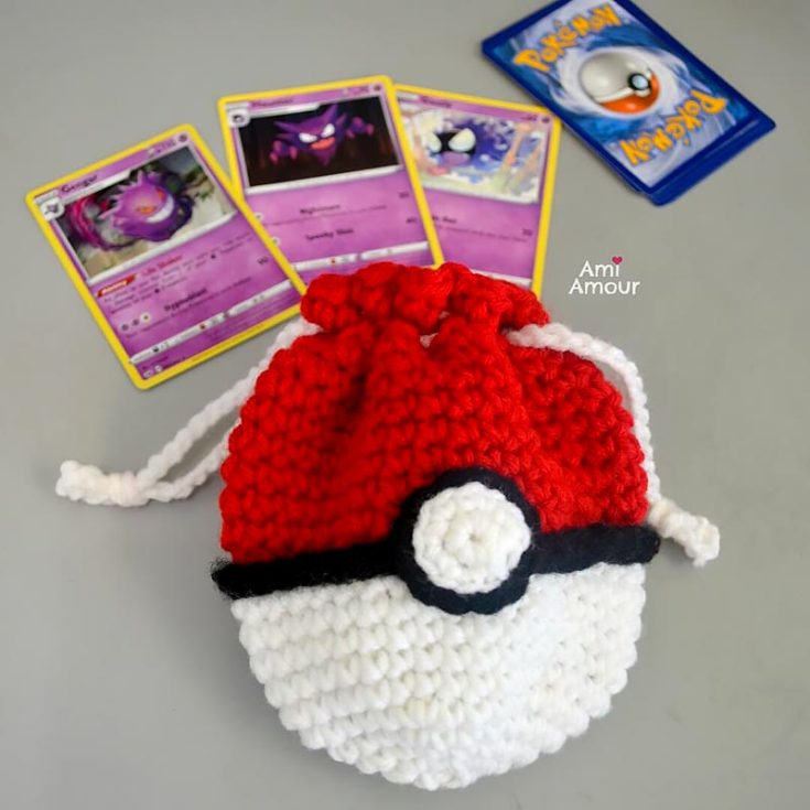 This isn't your average crochet bag; it's a drawstring Pokemon crochet bag. It's not only adorable, but it also serves a practical purpose as a storage bag for Pokemon playing cards, dolls, and anything else you want to keep organized.