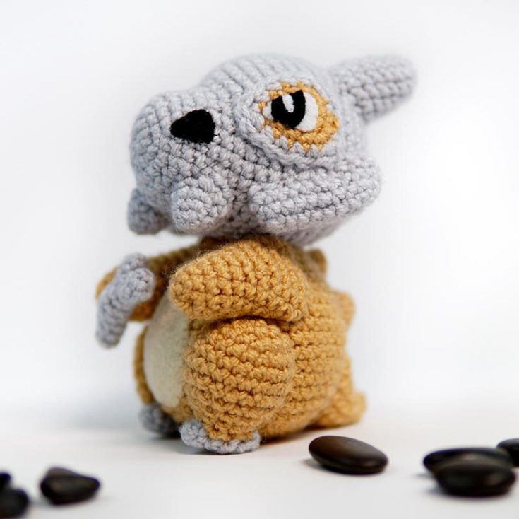 Although Cubone is a loner Pokemon, I'm sure they would love your company. Although it wears its skull as a helmet, looking tough, it secretly cries at night for its mother. What a sweet thing to crochet, no?