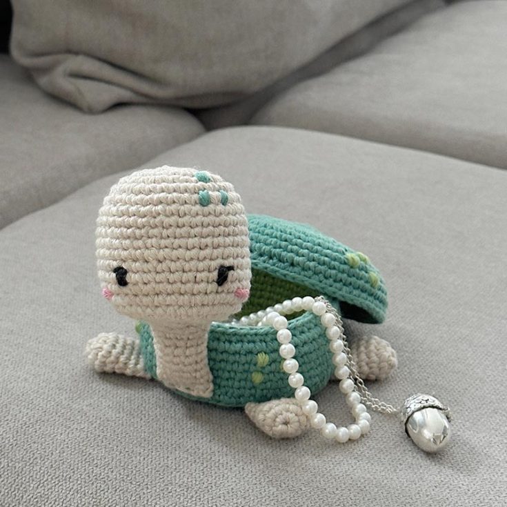 I love this one-of-a-kind jewelry box in the shape of a turtle. This fun project not only hones your crochet skills but also lets you create a charming home for your precious gems and trinkets.