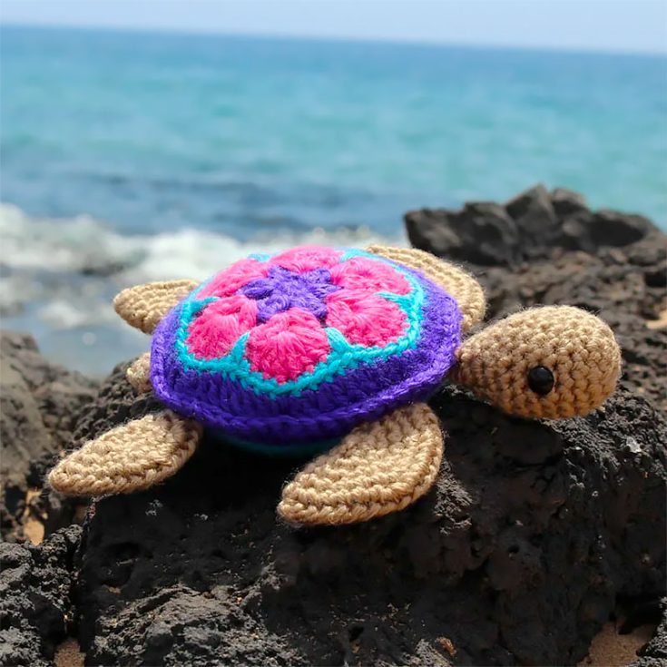 Measuring 6.5 inches long from head to tail, this sea turtle amigurumi crochet pattern is great for cuddling with. The 6-petal African flower hexagon is a lovely unique design on the shell as well.