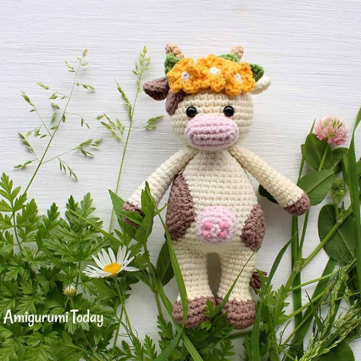 This sweet and friendly cow is ready for the warm weather and springtime! She's decked in lovely flowers and can't wait for playtime in the sun. This cow crochet is an intermediate pattern worked in continuous rounds.