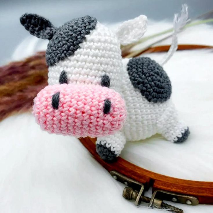 If you're trying to figure out different proportions for your crochet cows, here's one with a slightly larger jaw. You can easily turn this adorable little cow into an ornament simply by attaching with&nbsp;it a string.
