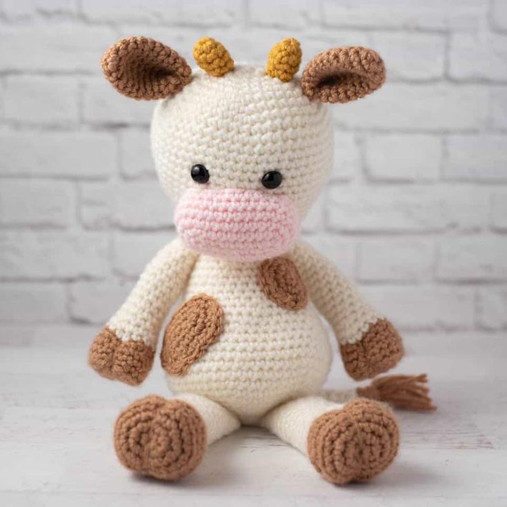 Switching up the typical black, white, and grey for this cream and toffee palette will absolute make you melt for your adorable crochet cow! Millie here measures 13.5&rdquo; tall, from top of head to bottom of feet.