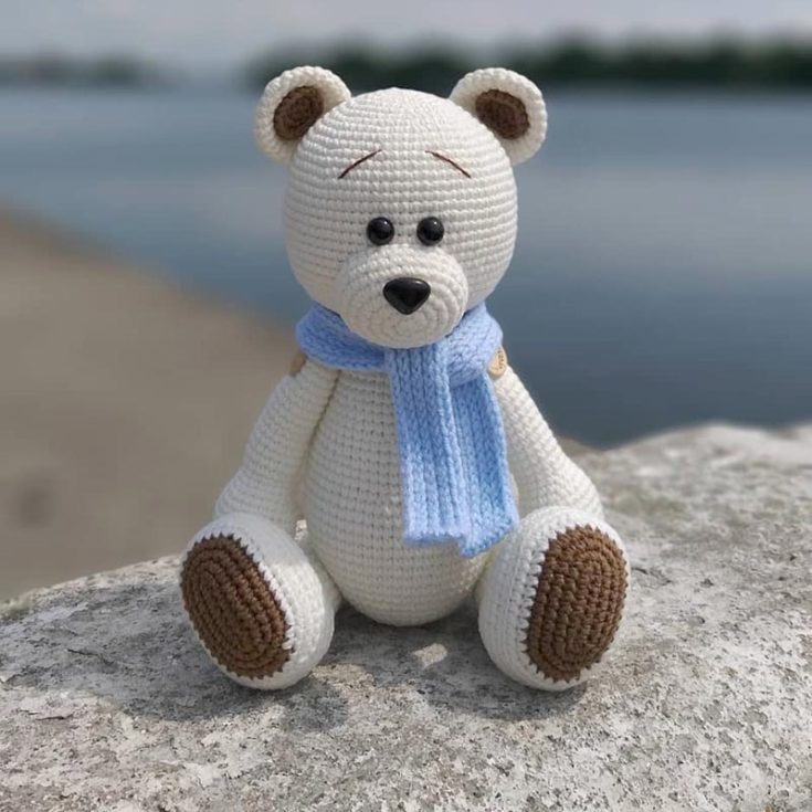 This crochet pattern for a bear is incredibly cute! You can experiment with different colors and add accessories like hats, coats, or a scarf (similar to the one he's wearing in the picture) to keep him warm in the winter.