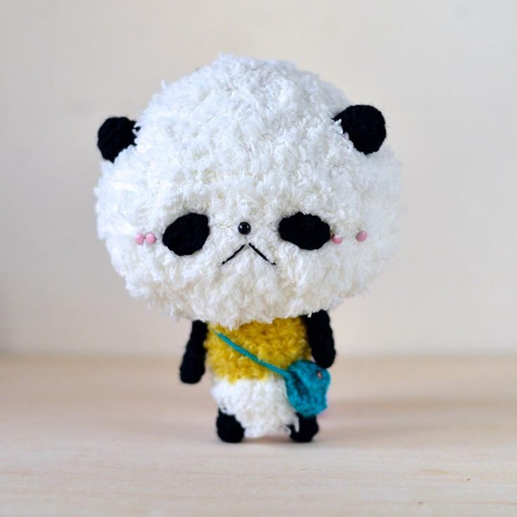 Meet the crochet panda, Pan-San, our oriental bear counterpart! He features soft fuzzy fur and big undereye circles that make him stand out from his western brothers.