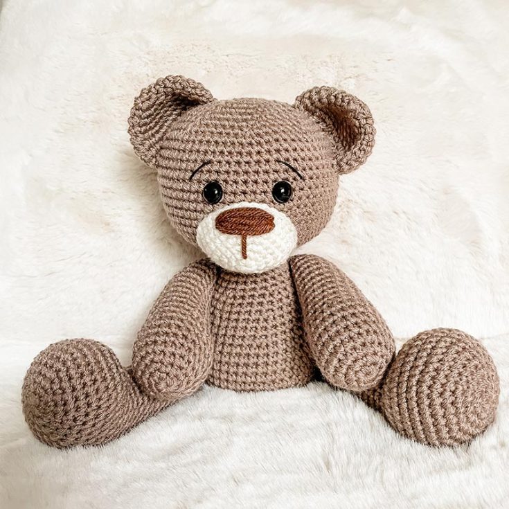 This cute bear has an expressive little face, and it is perfectly cuddly too! This teddy bear is made to sit as a decoration or become a beloved crochet teddy bear toy.