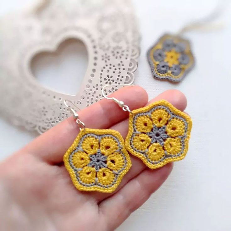 This pair of African flower crochet earrings features a lovely floral pattern that will be perfect for summer, spring, or a lovely tropical trip.