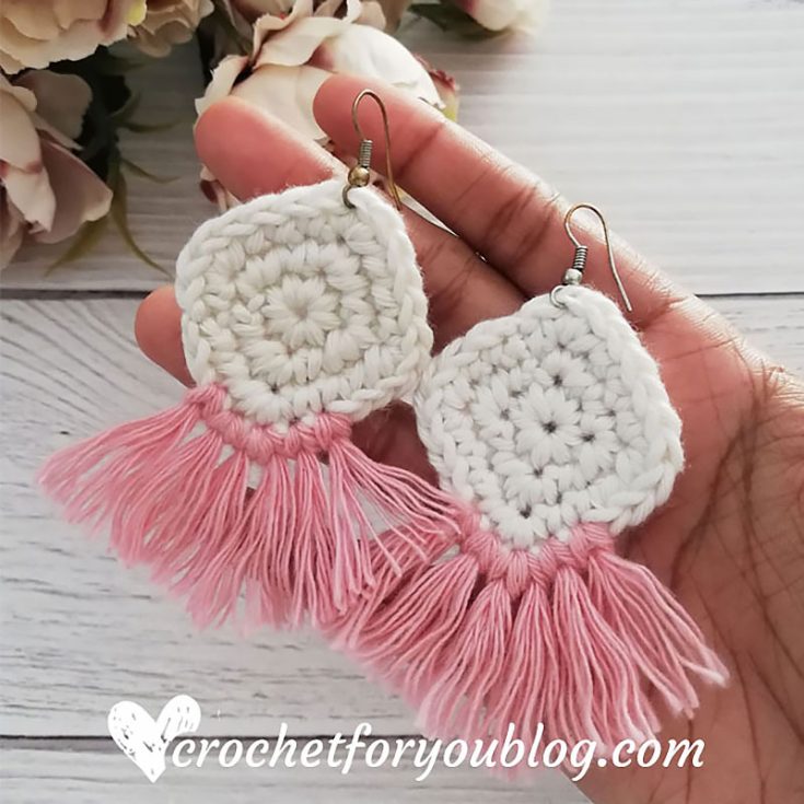 With a small amount of scrap cotton yarn and the ability to do a single crochet, you'll create this pair of lovelies in no time! These square-shaped boho earrings with frills would be lovely additions to any summery outfit.
