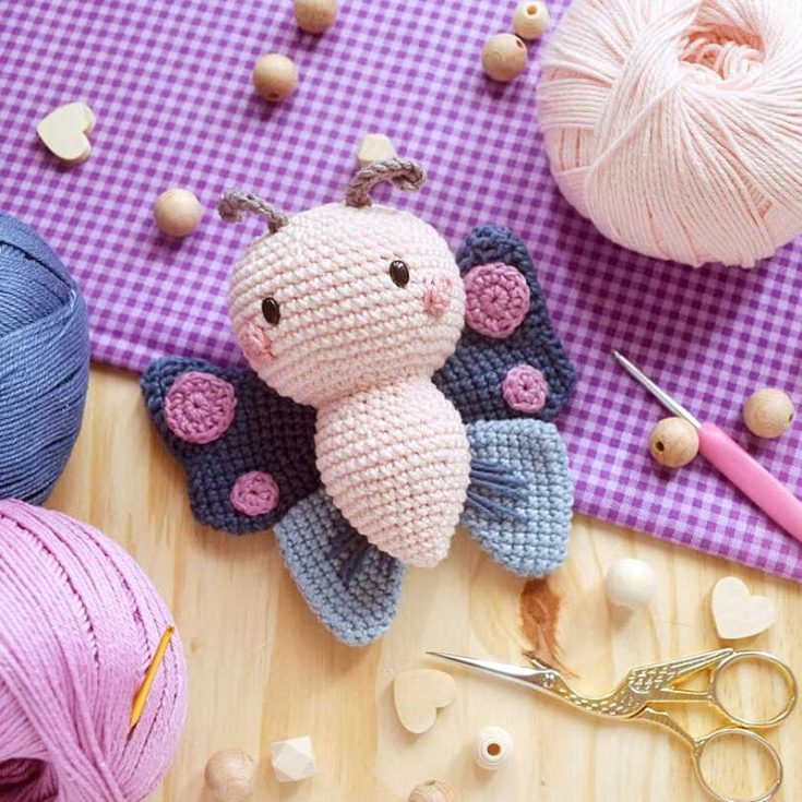 We have cuteness overload butterflies for you, too! It can be a sweet homemade gift or a charming addition to your decor. Who wouldn't want a little butterfly buddy they made themselves, right? Check out the pattern and give it a whirl!