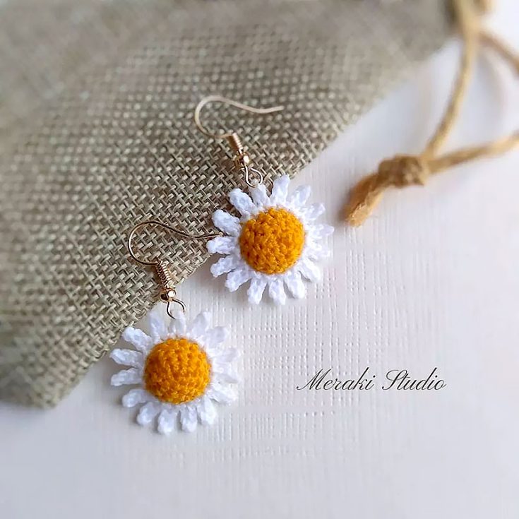 These dainty daisy crochet earrings would pair wonderfully with a plain casual top or a lovely floral dress. Make matching pairs for you and your daughter or your friends, and have fun wearing them all spring.