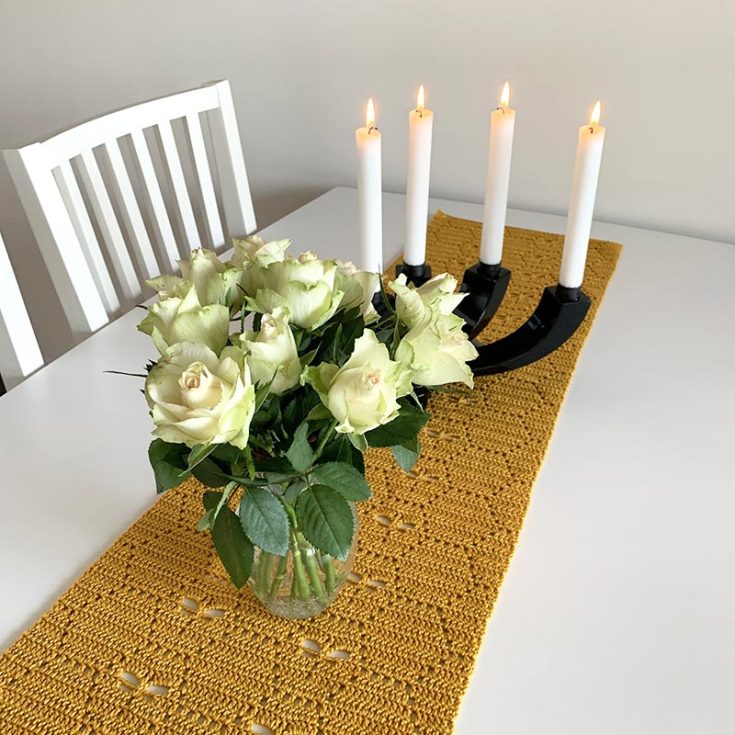 This unique runner is a centerpiece that will earn you compliments by whoever lays eyes on them! It's a bold hexagonal pattern with dragonflies scattered throughout. A fantastic pattern indeed.