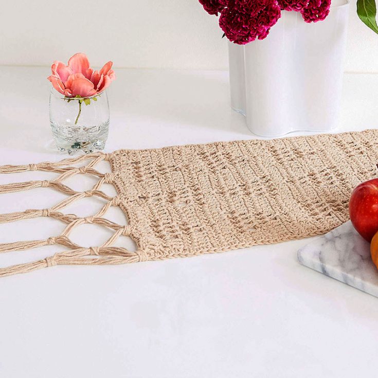 Want something that's not too simple that it fades into the background but something that's not too loud that it snatches the attention away from everything else? This lovely geometric triangles filet crochet table runner is the one for you!