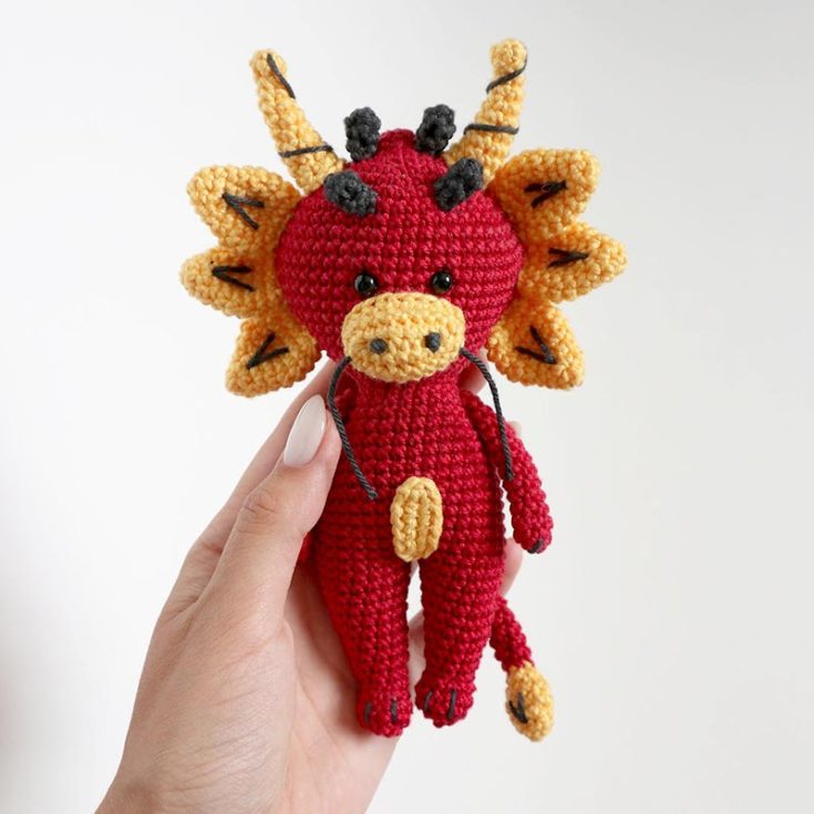 Inspired by the Chinese zodiac and the year of the Dragon, this free dragon crochet pattern features the more traditional elements of the Chinese dragon.