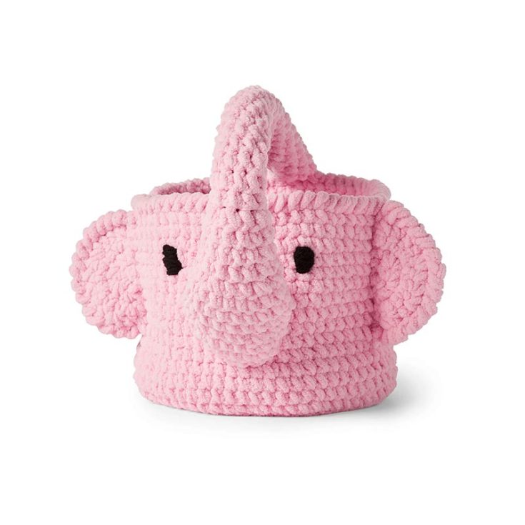This adorable crochet elephant basket is not just a cute addition to any room but also a functional piece for stashing away clutter.