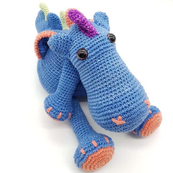 Dennis the Dragon is a free crochet amigurumi dragon pattern that is not too difficult and would be a great challenge for those who have never attempted amigurumi. The pattern is written in UK crochet terms.