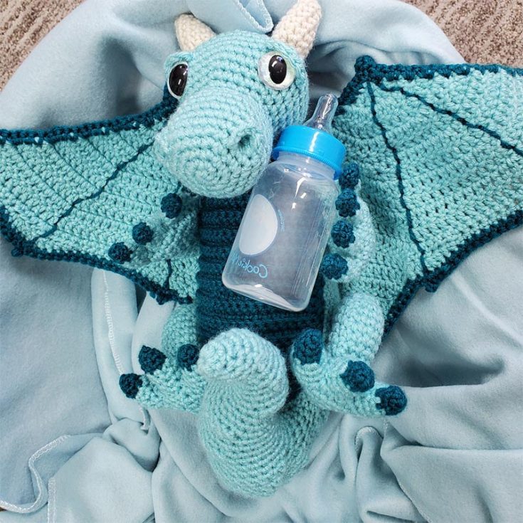 Toby, the Newborn Dragon Crochet Plushie,&nbsp;is a huggable&nbsp;amigurumi crochet pattern! His unique feature? He has large floppy wings that he loves to hug himself with.
