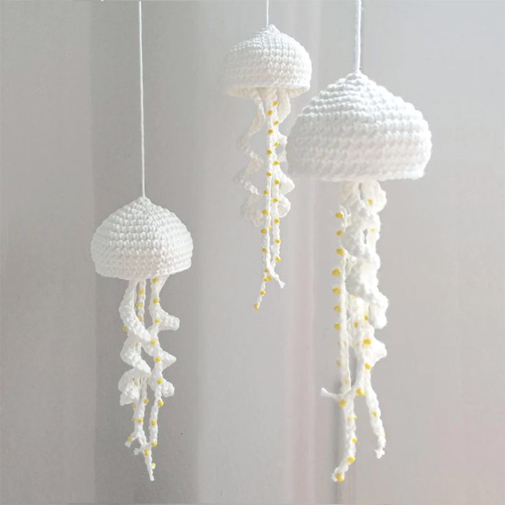 This free pattern from Lalylala features a simple yet beautiful crochet jellyfish pattern that is intended to be a baby's mobile. Crochet it with soft gentle colors for a mobile for a calming night's sleep or bright bold colors for an energized playtime toy.