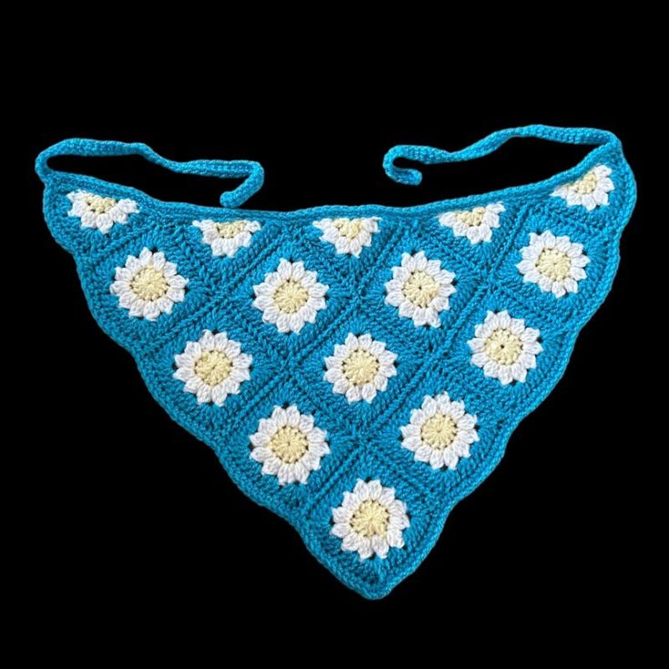 I'm sure you've caught wind of this daisy flower granny square bandana that stormed the fashion industry last summer through spring. Here's a tutorial on how to make one for yourself!