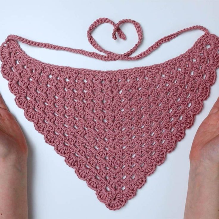 This crochet head kerchief, as the pattern calls it, uses the popular crochet granny stitch. Because of that, the bandana boasts a pretty, lacy pattern so apt for summer and spring! It's approx. 18&Prime; across (not counting ties) and approx. 10&Prime; long.