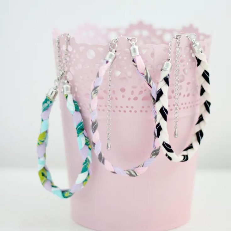 Did you know you can make breathtaking friendship bracelet patterns with fabric scraps? If you are thinking of throwing out any old T-shirts, save them first because you can always upcycle them into bracelet designs just like this one. Just add jewelry endcaps to secure the bracelet around your wrist, and you&rsquo;re all good to go.