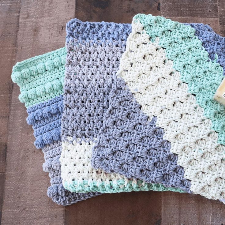 This three-in-one crochet washcloth pattern may just be what you need to replace the rags you're using in your kitchen. They each measure 9&Prime; x 9&Prime;. The first one utilizes the corner-to-corner technique/stitch; the second one incorporates fun bobbles between rows of single crochet, and the last one is an alternating pattern of back and front double post stitches.