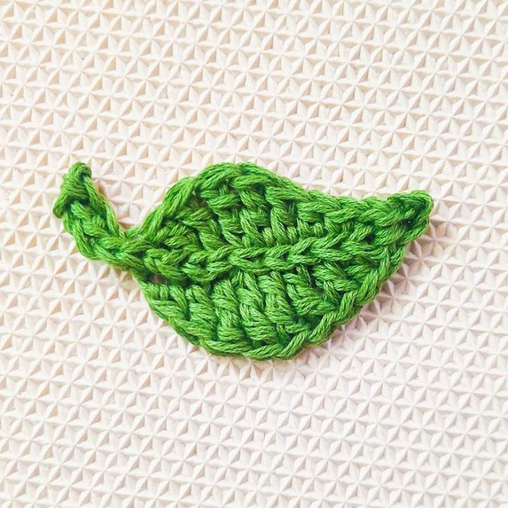 Pair this beautiful crochet leaf applique pattern with other crochet leaf and flower motifs. This pattern uses simple stitches worked across the chains, making it very easy. Stitch them together into a chain and have a pretty leaf garland!