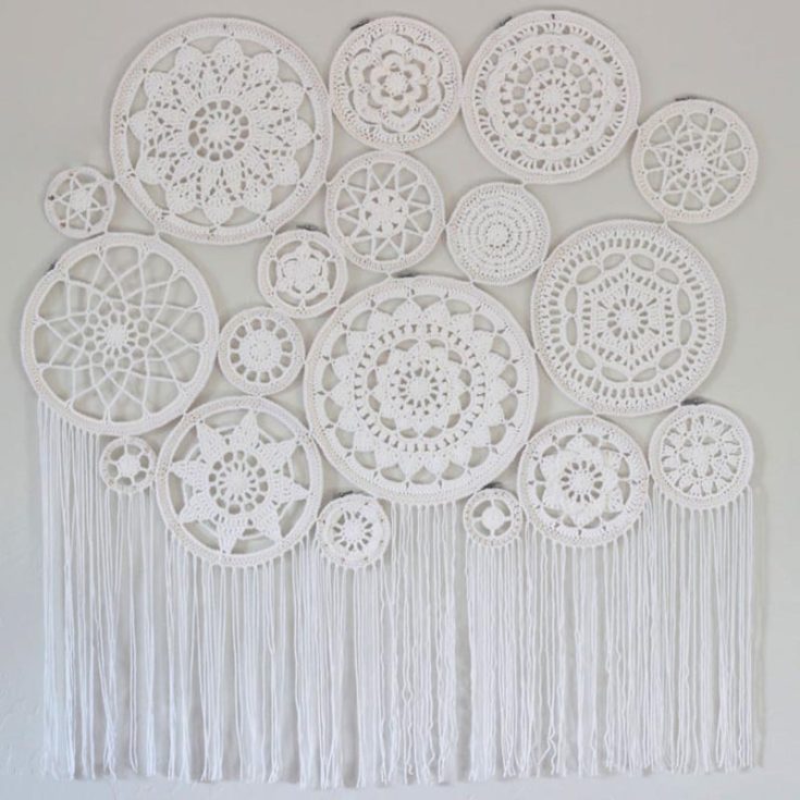 Designed for wall art, this pattern features multiple mandalas crocheted around hoops of various sizes and joined together to create gorgeous wall art. Use different colors if that is what your house needs. The fringes at the bottom add a more boho, dramatic flair.