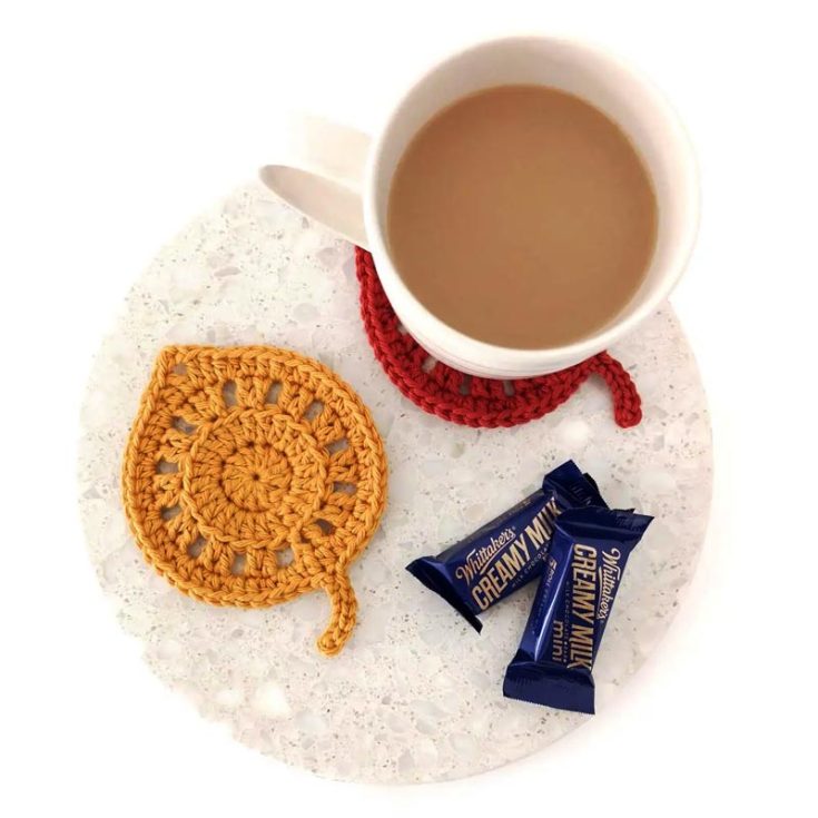 Who knew crochet leaves could be coasters as well? The chainless starting double crochet stitches make the piece look seamless&mdash;a polished, well-put-together coaster.