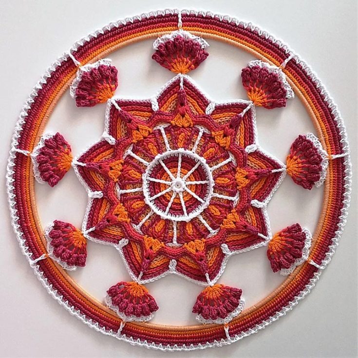 Made with the Scheepjes Catona yarn, 50g skeins, and the fingering weight yarn (14wpi), you&rsquo;ll be on your way to creating this glorious mandala masterpiece. Doesn&rsquo;t it look like strawberries from afar? Download the PDF guide to learn how to make this.&nbsp;