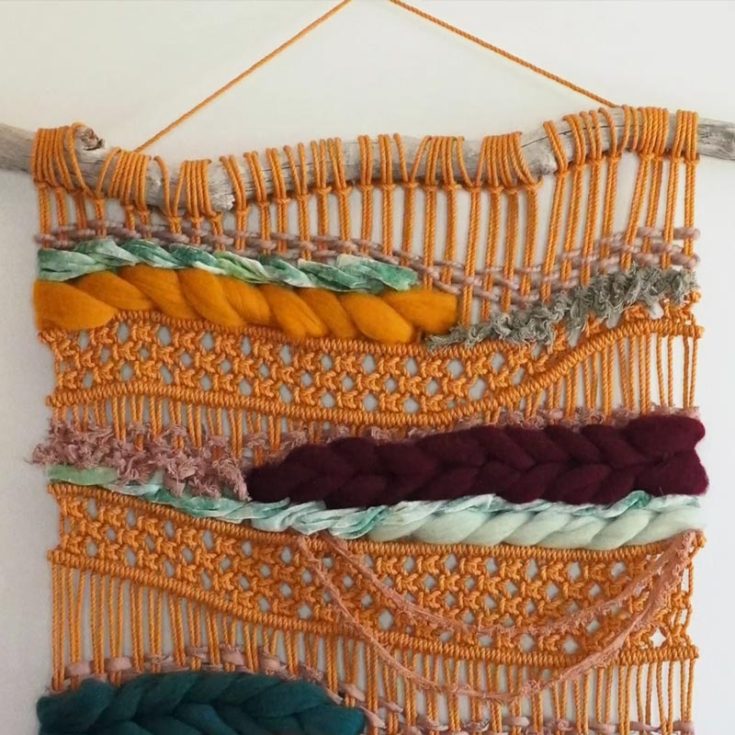 Similar to the Macraweave pattern, this design involves more colors and materials. For example, yarns, rovings, ropes, and ribbons! Just follow the video tutorial and the written instructions in the description to make this stunning macrame wall hanging design with ease.