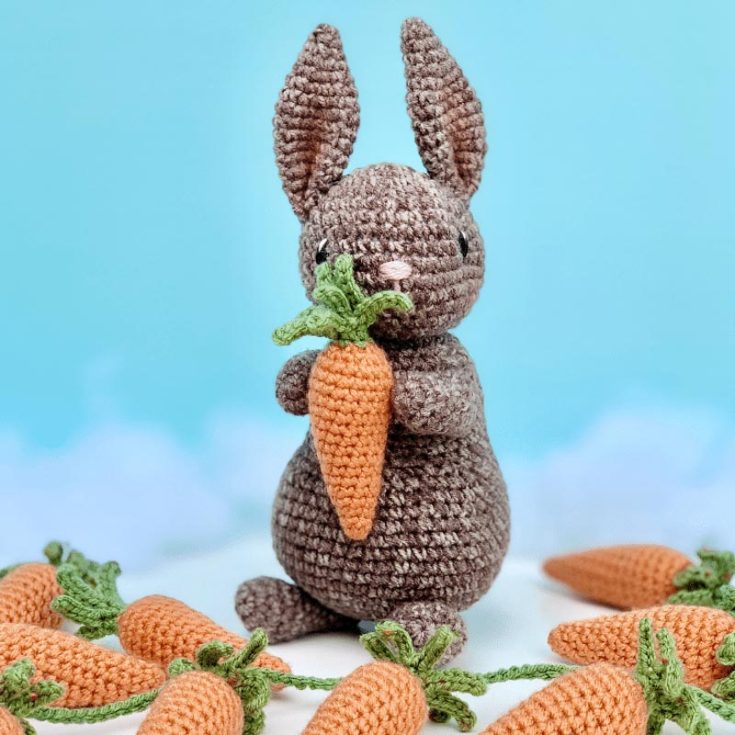 Meet Turnip the Bunny and his carrot friends! Learn how to crochet this cutie who loves collecting carrots for springtime. It also fits right into a Peter Rabbit-themed nursery.