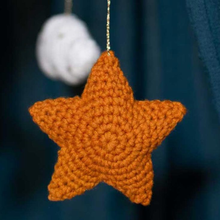 This starfish-inspired crochet star will make a lovely ornament for adorable keychains, Christmas tree decor, or a garland for a baby room. It's a pretty simple pattern, and you will have no trouble learning.