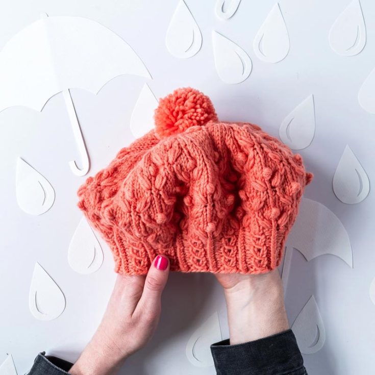 This adorable beret-style hat is perfect for a fun day out with your friends! This hat looks like a flower bud waiting to bloom from the top because it&rsquo;s constructed with a bobble pattern. It offers a sophisticated yet playful look, and it&rsquo;ll make you stand out from the crowd. The finished sizing is 16.75&rdquo; x 28.23&rdquo; x 8&rdquo;.
