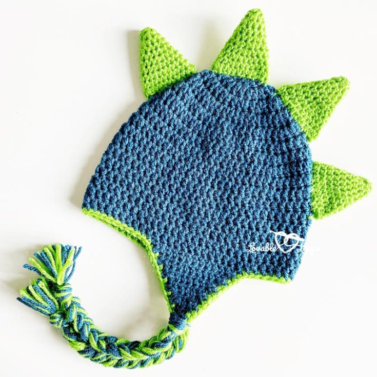 Make this beginner-friendly crochet dino hat pattern for your children and yourself to match. It is made with pointy spikes and some tassels and comes in 3 sizes (toddler, child, and adult).