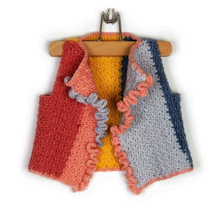 Crochet this fun and vibrant ruffle piece for your little one! This easy crochet pattern uses only minimal seaming and simple stitches. The sizes are made for 2 to 8-year-olds.