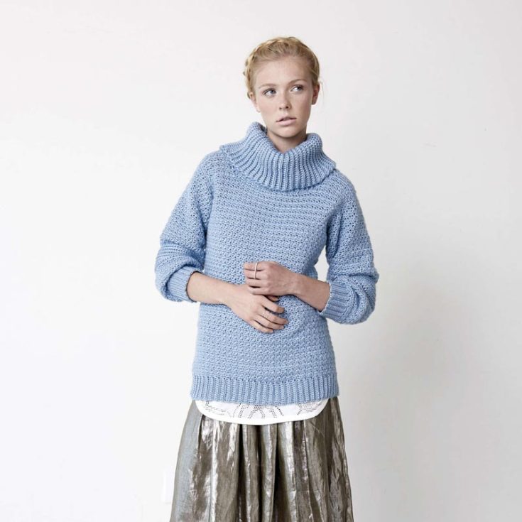 This solid, easy cowl neck sweater is both comfortable and elegant. Wrap yourself in it to run errands, meet a friend, or curl up at home with Netflix. It's that versatile! It's an easy pattern that comes with instructions for sizes XS-5XL.