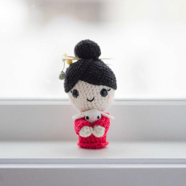 Celebrate the Chinese New Year in style with this Chinese New Year crochet doll pattern. It features a little Chinese doll with her head up in those elegant, classy buns wearing a red dress - the color of auspiciousness in Chinese tradition!
