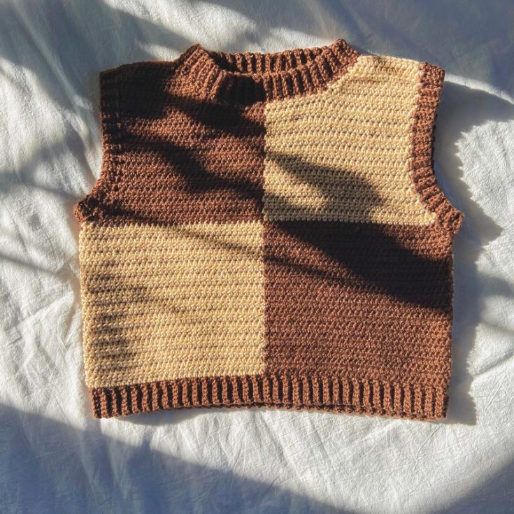 Make this adorable crochet checkerboard sweater vest pattern inspired by the cutest cookies! Guess if you know which cookie this was fashioned after before clicking in to find out. Available for sizes S-3XL.
