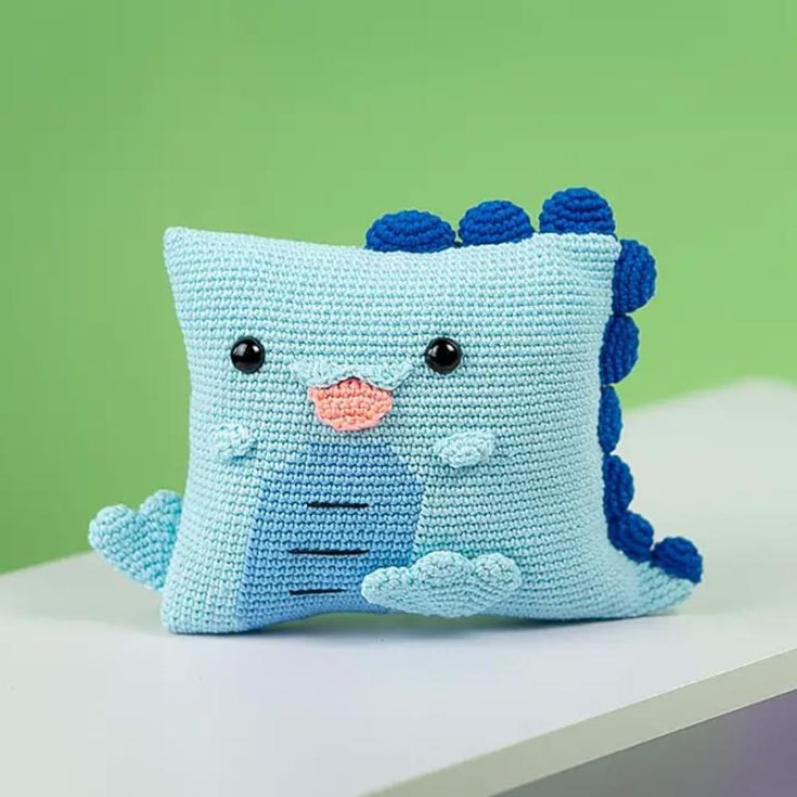 With blankets, you need pillows, or to be more specific, pillow covers! Learn how to make these cute dinosaur pillow crochet patterns, and you'll have yourself a full bed of dino-themed cuddle buddies.