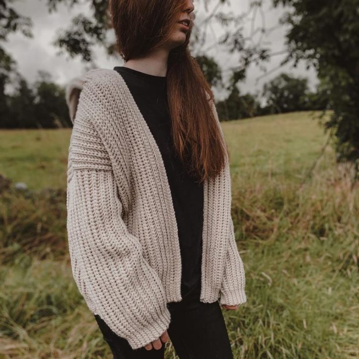 Similar to the knit stitch, this is an oversized crochet hooded cardigan with ribbed textures. It's thick, comfortable, and acts like a jacket to be layered upon other undergarments to keep you warm for any season. The sizes include S-3XL.