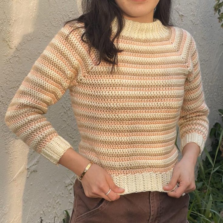 This sweet and elegant sweater looks so calming to the eyes. It's made in three colors: cream, pink, and brown. Though the sizing of this design is made to fit the author, feel free to add or remove rounds for the yoke according to your measurements. It's an intermediate project, and the design is worked in one piece, which means no sewing!