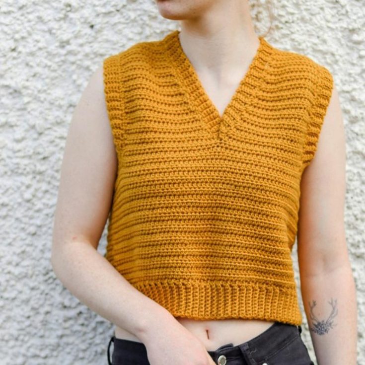 Learn how to make this classic crochet V-neck vest top by following the step-by-step guide and video tutorial on the pattern. The pattern has instructions for sizes S-3XL, and the vest can be layered with any desired top.